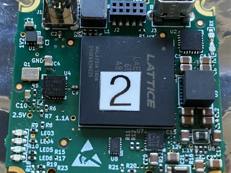 Compact Camera Link to CoaXPress converter on customer camera
